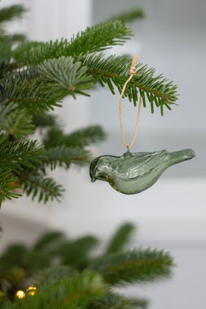 Green glass, bird-shaped Christmas decoration