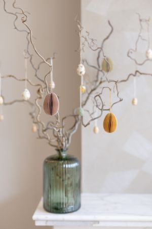 Egg-shaped, pink paper Easter ornament