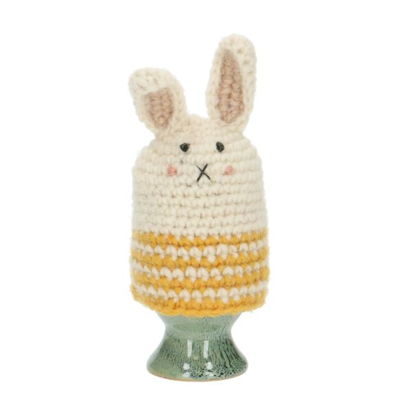 Yellow, rabbit-shaped egg cosy