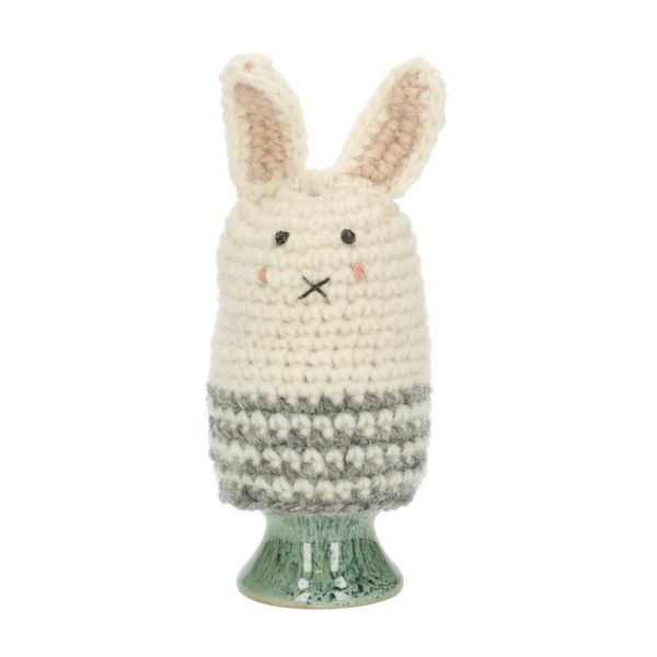 Grey, rabbit-shaped egg cosy