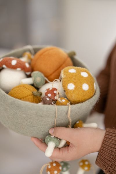 Large, green, round felt basket