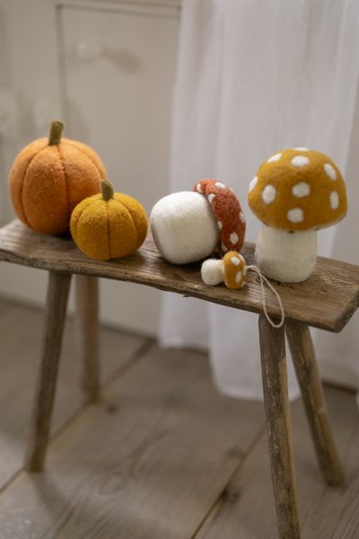 Yellow, felt mushroom decoration