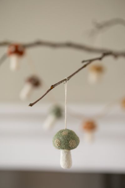 Green, felt mushroom decoration