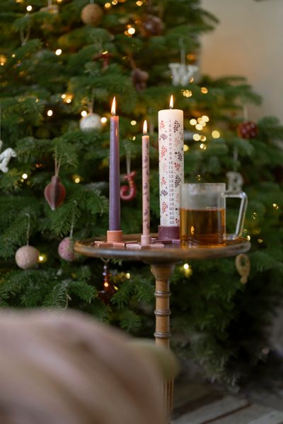 Terracotta-coloured, star-shaped porcelain candlestick for dinner candle