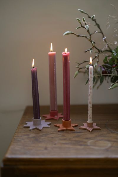 Purple, star-shaped porcelain candlestick for dinner candle