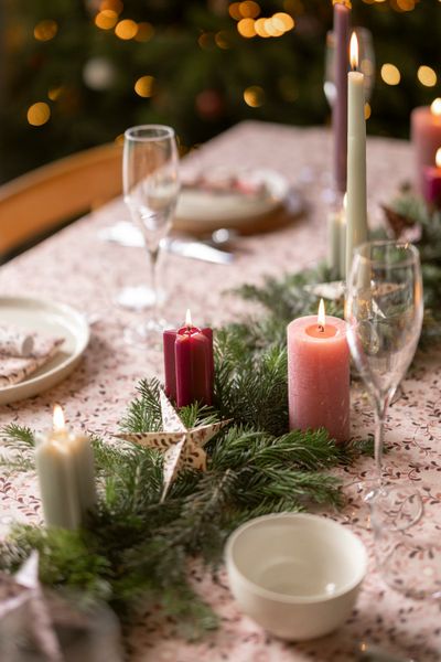 Tall, red, star-shaped candle