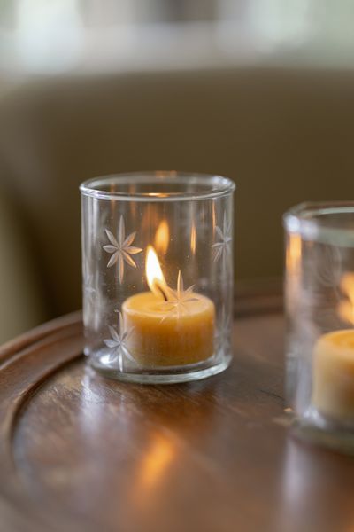 Glass tealight holder with engraved stars