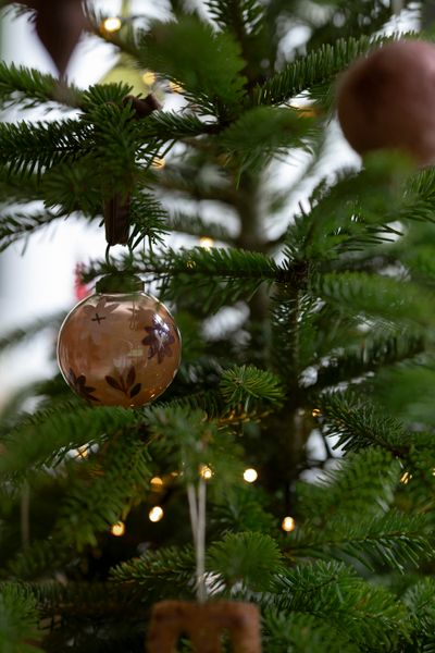 Small, pink-red, hand-painted glass Christmas bauble