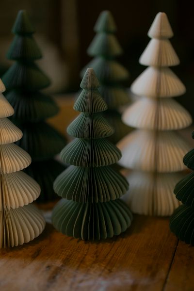 Small, dark green, fold-out paper Christmas tree