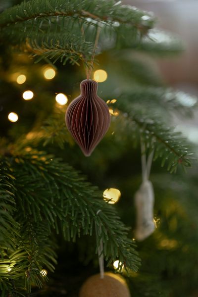 Red, fold-out, icicle-shaped paper Christmas decoration