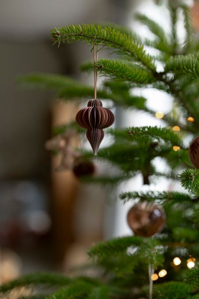 Red, fold-out, paper bell-shaped Christmas decoration