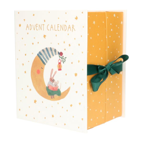 Carboard, fold-out Advent calendar with a moon and reading rabbit