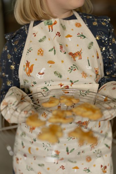 GOTS organic cotton children’s apron with a Christmas animal print