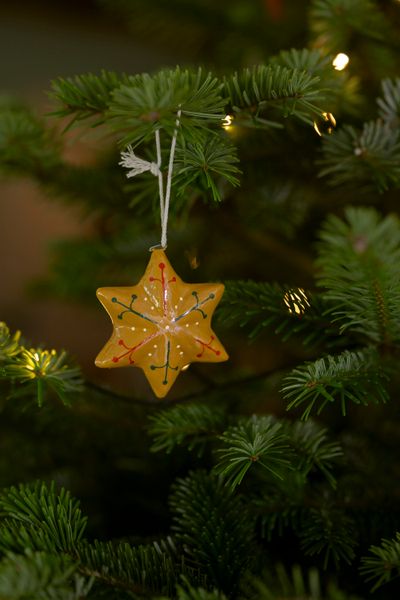 Yellow papier-mâché star Christmas decoration, approx. 5 cm