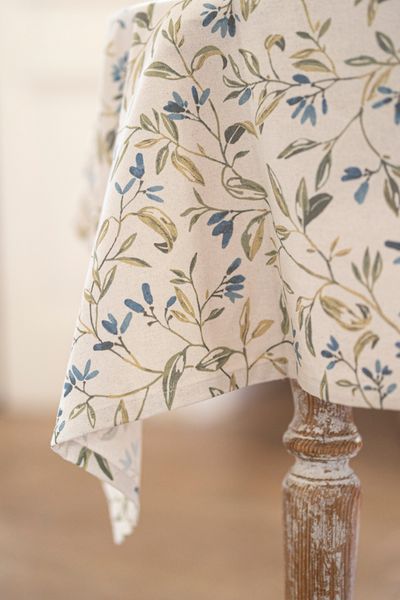 GOTS organic cotton tablecloth with a blue, winter blossom motif, 145 x 180 cm