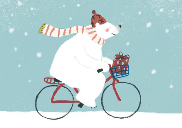 Ours blanc à vélo